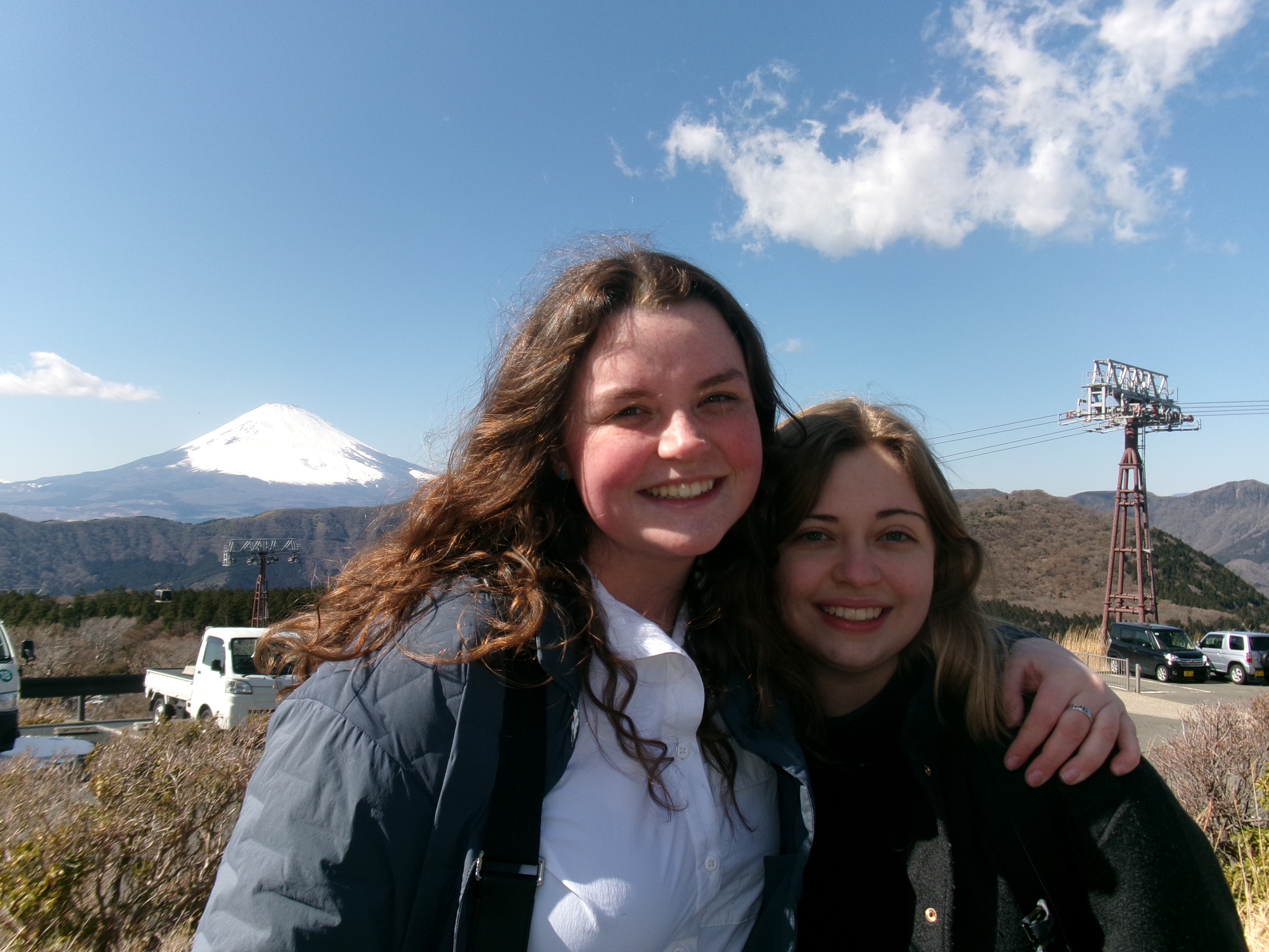 Skylar and Ihlara Williamson in Hakone, Japan, in front of Mt. Fuji, Japan. Taken while backpacking Japan.